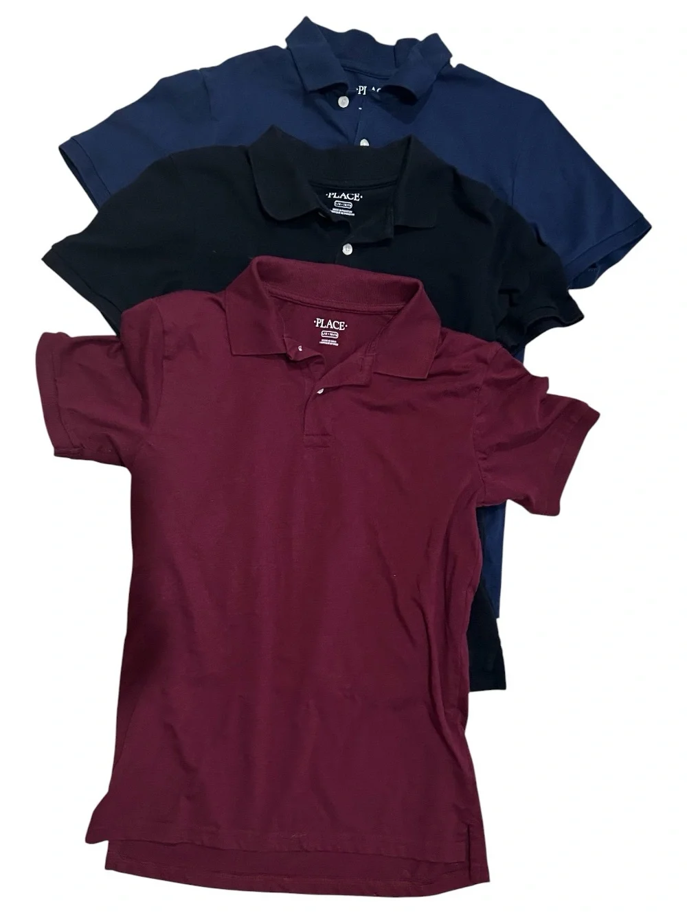 Three Polo Shirts in Navy, Black, and Burgundy